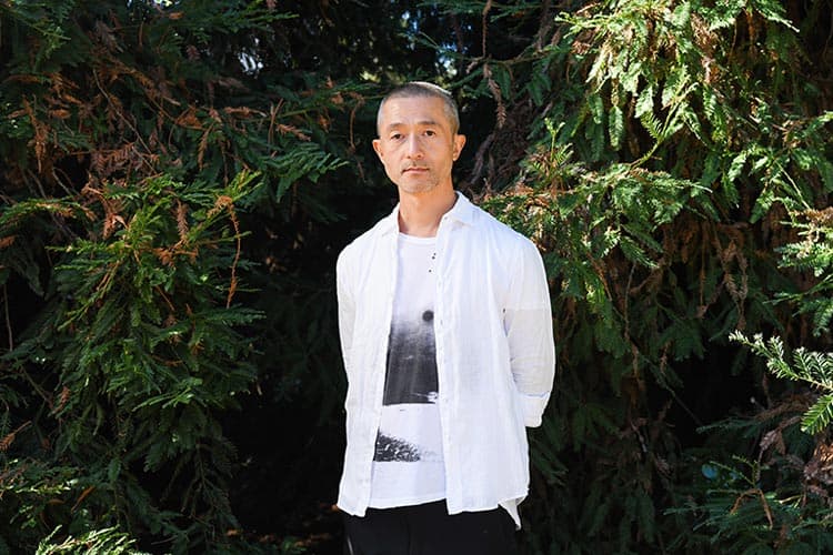 Photo of a person posing for the camera.