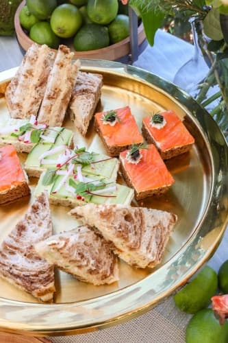 A tray with various tea sandwiches.