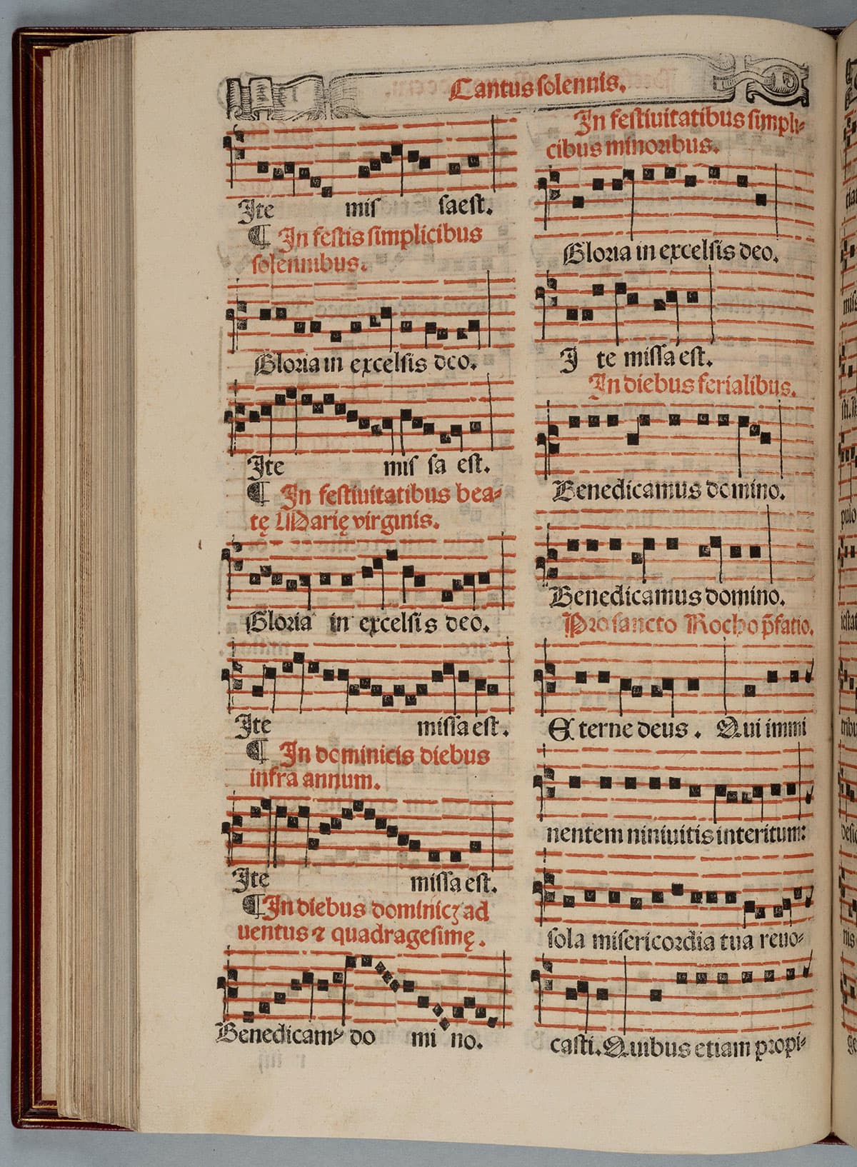 A book opened to a page with musical notation.