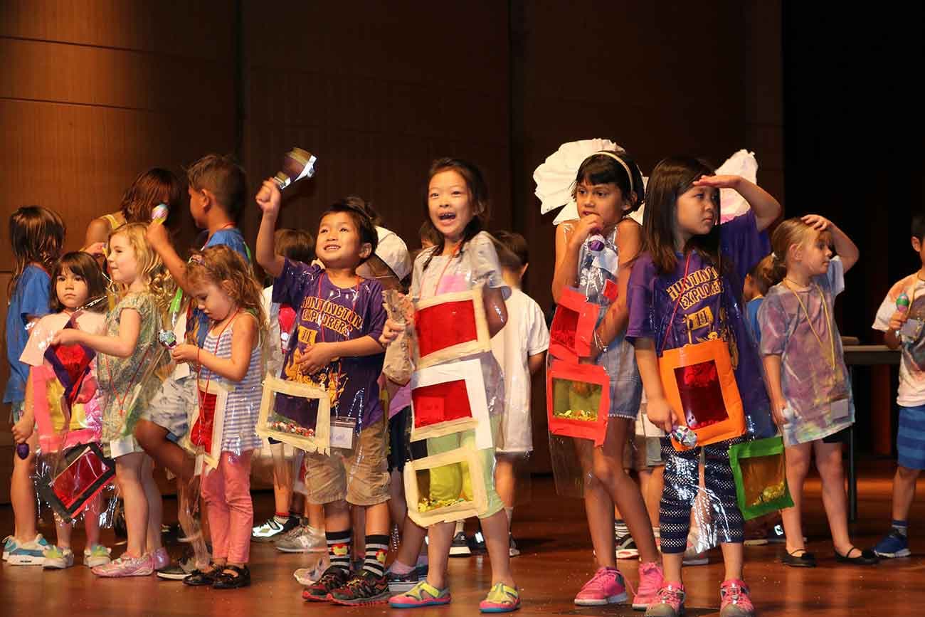 Explorers campers performing on stage
