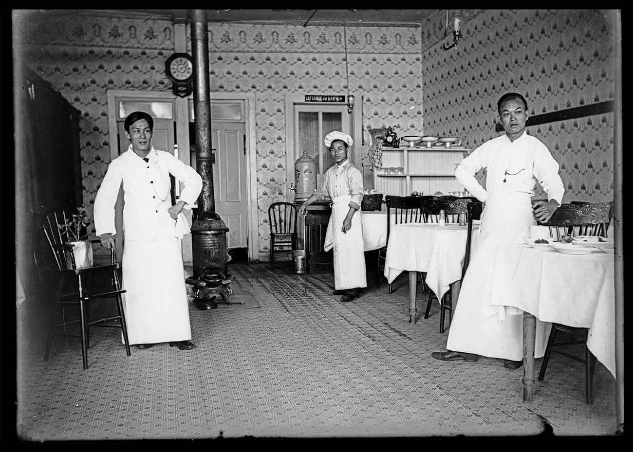 Unknown photographer, Chinese cook and waitstaff in a restaurant, Old Chinatown, Los Angeles, ca. 1900. The Huntington Library, Art Museum, and Botanical Gardens.