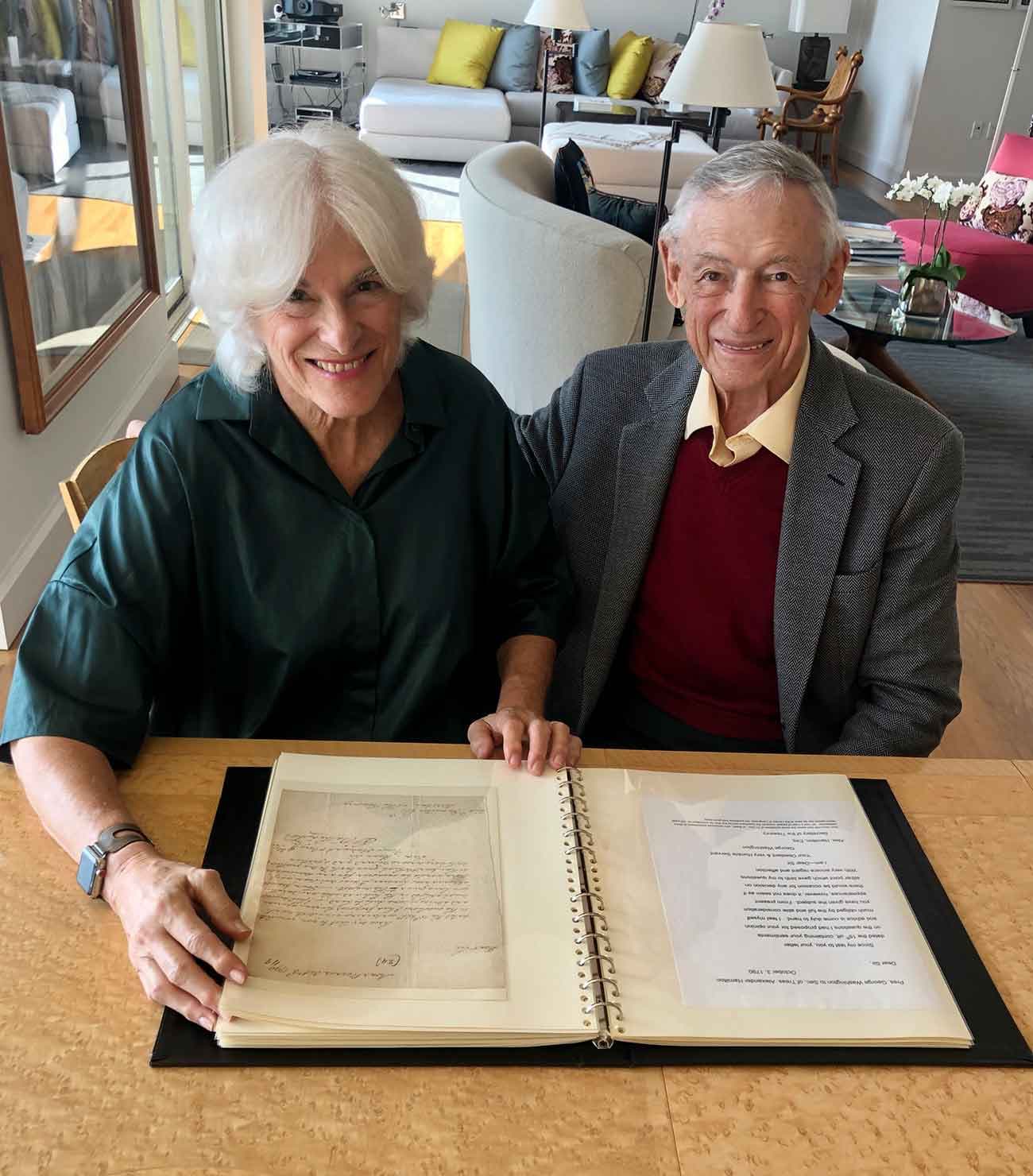 Susan R. and L. Dennis Shapiro with some of their presidential letters and related materials.
