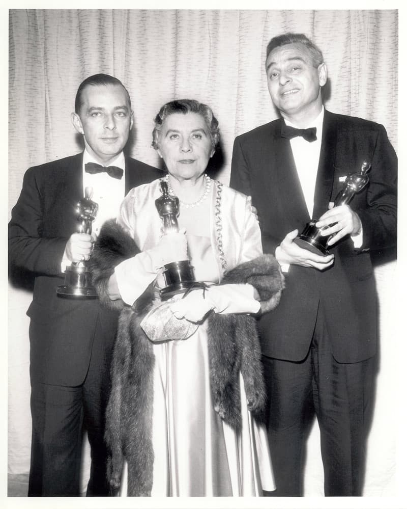 Sonya Levien, William Ludwig (far right), and an unidentified man at the 1956 Academy Awards