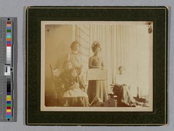 Bessie and Alice Ah Tye with two women and a child