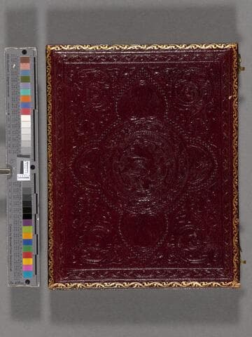 Postmortem photograph of child Margaret Hereford Wilson, lying on a bier with flowers around her