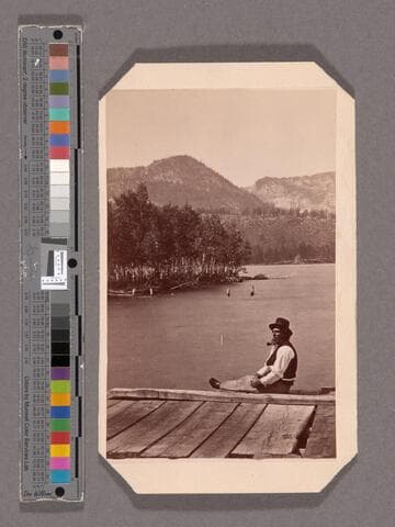 Ephraim "Yank" Clement on old pier at Yank's Hotel, 1876