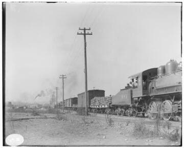 Transmission lines along Southern Pacific tracks at an unknown location