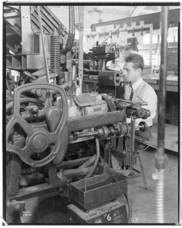 Man working with Linotype machine at Beverly Hills Printing Office