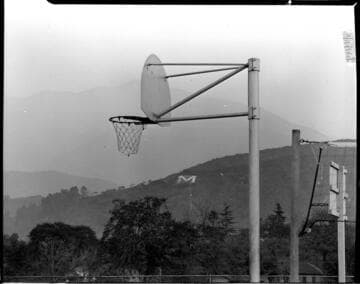 Basketball courts (huge letter M can be seen in the distance on a hillside)