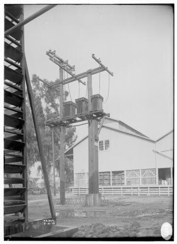 A transformer on a distribution pole at Lordsburg Packing House