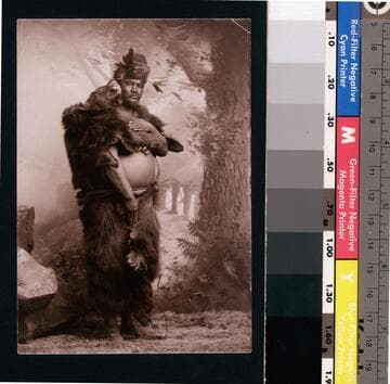 Charles Brown (Hi Shay Ko Ma), a well-known Pomo Indian from the Ukiah area, poses wearing a bearskin