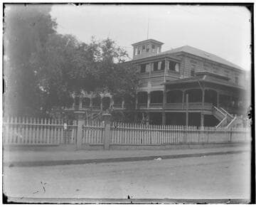 Street view of a large wooden building