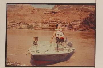 Ed l'Anson in the "Bootoo." Camp at Mile 70. Ed was the FIRST man to go through the Grand Canyon wearing a plug hat