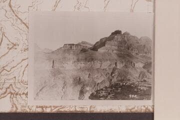 Stanton camera note 1890, Feb. 10:  "Climb to top of Granite & 1st bench of Sand Stone 1025 ft. and take views."