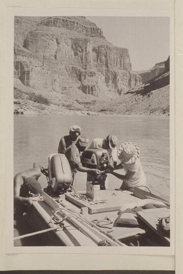 Mile 123.  Repairs to "Bootoo" engines.  The "Bootoo" hit the submerged island at the foot of Forster and wrecked both engines.  Ed l'Anson is at left; then Brian Rowlands, Chuck Richey, and Garth Marston