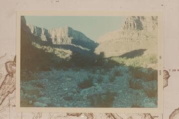 Up Bridge Canyon.  The trail goes up left and through the notch