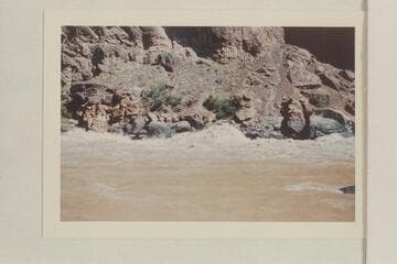 Large wave at right in Vulcan Rapid. Approximate gauge: 36,000 cfs