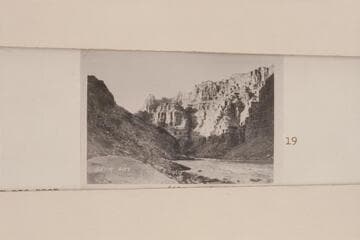 Down from Mile 202.4 left bank in Cataract Canyon showing the lower end of Rapid 22 with 23 in the distance.  8 AM