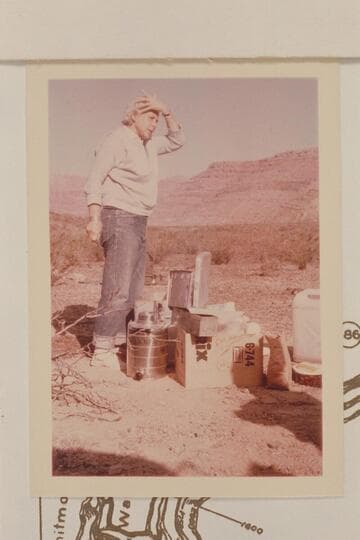 Fran Belknap puzzles over the supplies. Head of Whitmore Trail