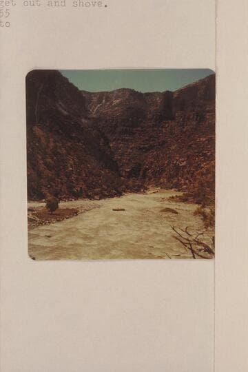 One of the Hatch pontoons on the rocks at the lower end of Hells Half Mile