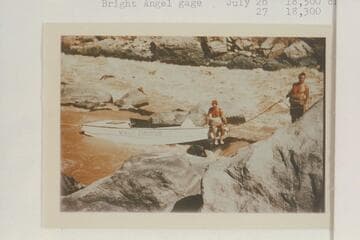 Lining the Nevills sadirons at Vulcan Rapid. Nevills perches on the bow. Joe Desloge handles the painter