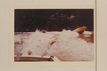 The "Wee Red" and the "Dock" top 217 Mile Rapid.  Approximate gauge:  20,000 cfs