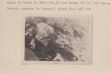 Rocks on left bank at Mile 195