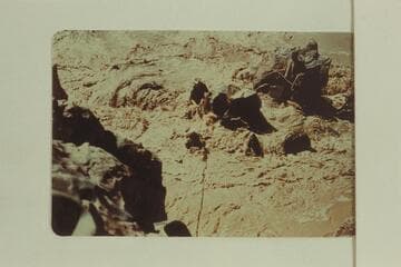 Upset at Mile 232.4:  Mrs. Schlosser being hauled across on rop, Frank Wright and John Harper were being pulled on shore and Duane Bishop and Bill Thompson are holding the rope on the rock