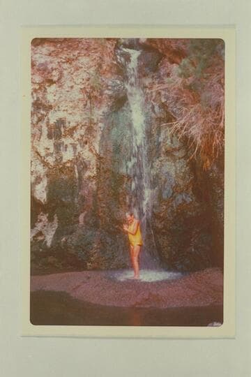 Hot spring in Black Canyon two miles below Hoover Dam. Jorgen Visbak enjoys a shower