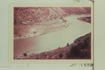 Down Desolation Canyon from top of talus at Mile 44.5. The sadirons and camp 12 at lower left