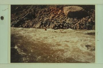 Rapid at Mile 212.15 showing Mac Terrell in the lead and Jorgen Visbak following and photographing Terrell