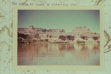 Southwest across Millard Canyon Benches to North Point and the Orange Cliffs. The butte at right is elevation 5760