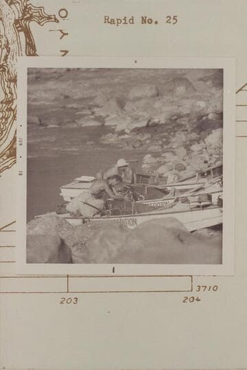 The fleet of three Nevills sadirons at left bank probably at Mile 202 in Cataract Canyon after the salvage of the "Joan" in the rocks of Rapid 23