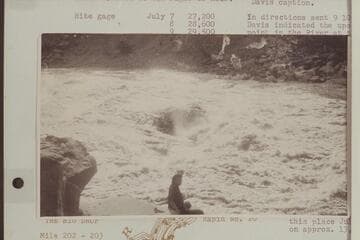 Fern Davis at the head of Rapid 22, Mile 202.4. Early AM. Davis caption: "On right bank--early morning--Rapid #22--Eddy's book--Fern Davis--Boat was flipped over backwards on the run thru about 25 feet to the right of hole."