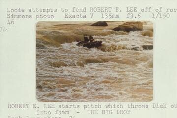 46. Looie attempts to fend "Robert E. Lee" off of rock