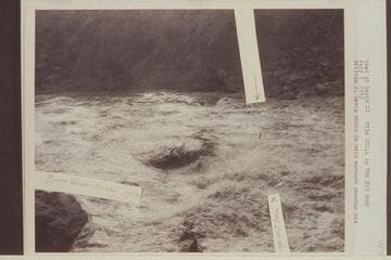 Head of Rapid 22, Mile 202.4 in the Big Drop. Photo has markers showing Davis's run which ended in capsizing