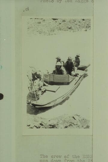The "Esmeralda" lands at the right bank above Lava Falls. Left to right: Marston' Hudson at the wheel; Taylor; Edward Hudson; Bestor Robinson