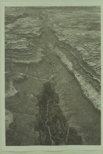 North of Gatagama Point looking southwest along tributary of 140 Mile Canyon.  The natural bridge is at center immediately below the junction with the side stream from the left