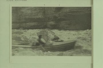 Upset Rapid.  The dunnage was portaged and the unloaded boats run to right of rock