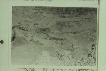 Crystal-Dragon junction from point where Stanton made his photo 354-486 1890, Feb. 10.  Top of Redwall and below Supai cliff west of center of shoulder at north end of Ra