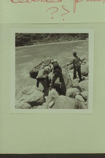 8. Head of Lava Falls. Lining Pontoon No. 2 down to be unloaded. Fred, Dick, Jack, Bruce, Clarke and Harry