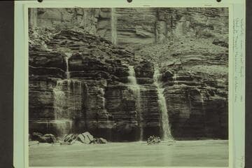 Waterfalls near Upset Rapid. Norm Nevills, Agnes Albert and Bill Schukraft in the "WEN"