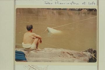 Start of salvage on inboard-outboard at head of Gneiss Rapid. John Harrington at left