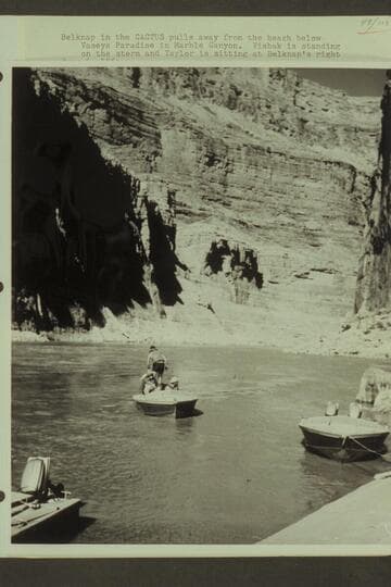 Belknap in the "Cactus" pulls away from the beach below Vasey's Paradise in Marble Canyon. Visbak is standing on the stern and Taylor is sitting at Balknap's right