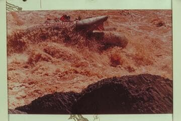 Grand Canyon Expedition's float about to drop into the hole at right of Vulcan Rapid