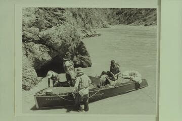 Preparing to cut loose from eddy at Mile 99.4 where Ed Hudson had abandoned his "Esmeralda."  His dunnage was loaded into the Marston craft in contemplation of continuation to Supai Creek.  Left to right:  Marston; Edward Hudson; Hudson; Forcier
