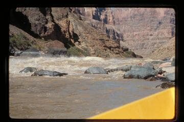 "Wee Red" climbs Vulcan Rapids