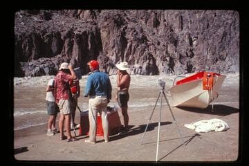 Damaged "Wee Red" on beach; Monument Creek Rapids