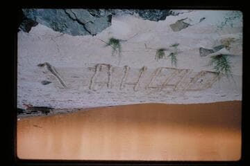 Sign of beach "1 AHEAD"