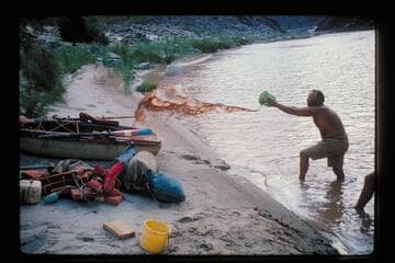 Belknap fills a boat to settle water; Diamond Creek